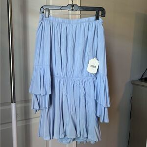 NWT. Size medium Chambray romper.
